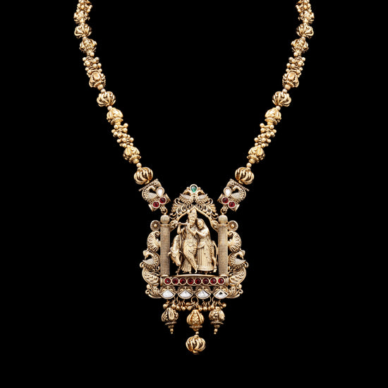 Festive Exclusive Antique Gold Finish Radha Krishna Hand Carved Jharoka Necklace Set with Jhumkis