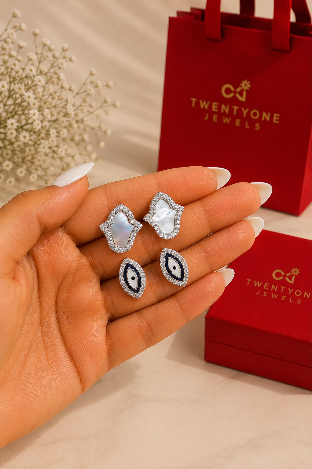 Twenty One Jewels Raksha Bandhan Combo of MOP Hamza and Evil Eye Studs on Pure 925 Silver