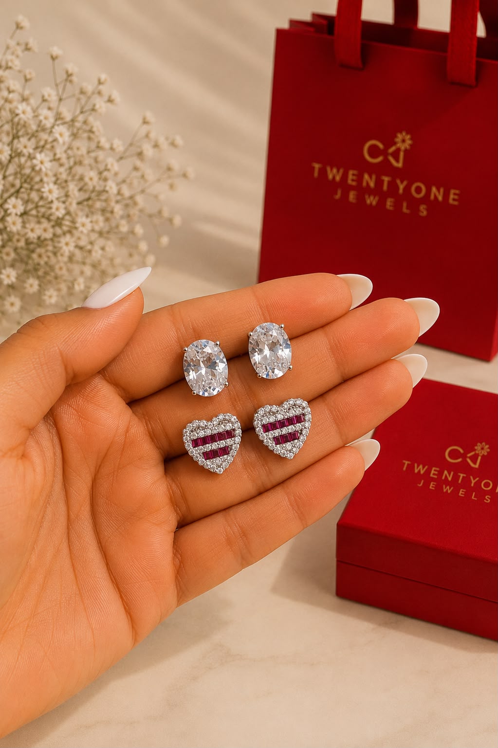Twenty One Jewels Raksha Bandhan Combo of Oval Solitaire and Ruby Baguette Heart Studs on Pure 925 Silver