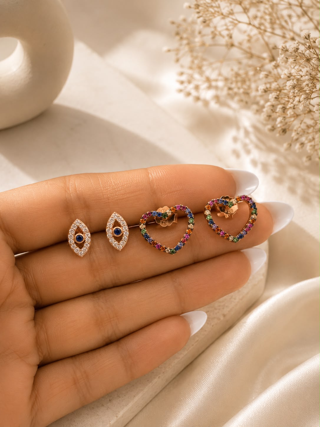 Twenty One Jewels Raksha Bandhan Combo of Rainbow Heart Studs and Evil Eye Studs on Pure 925 Silver