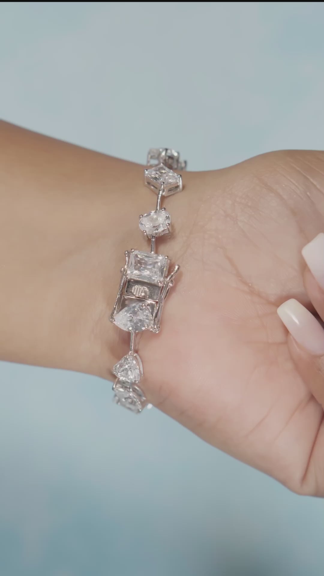 Load and play video in Gallery viewer, Premium Multi Solitaire American Diamond Tennis Bracelet on Pure 925 Silver.
