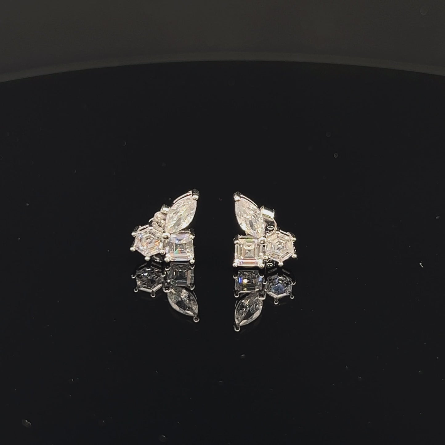 Load and play video in Gallery viewer, Premium  Petite Tri Solitaire Vienna Studs on Pure 925 Silver
