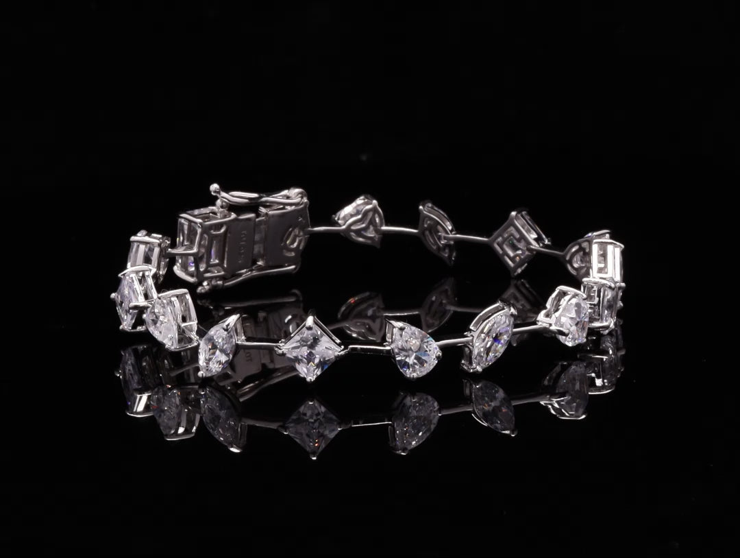 Load and play video in Gallery viewer, Premium Multi Solitaire American Diamond Tennis Bracelet on Pure 925 Silver.
