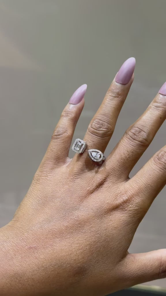 Load and play video in Gallery viewer, The Emerald Cut and Drop Solitaire Suvasa Ring On Pure 925 Silver
