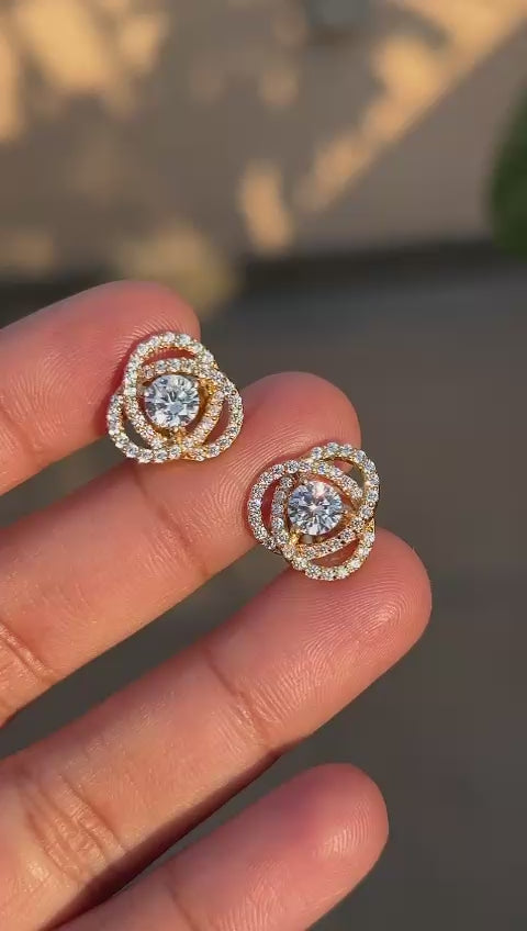 Load and play video in Gallery viewer, Intertwined Cluster Fauzia Solitaire Studs with Premium Screw Backs-18k Gold Finish
