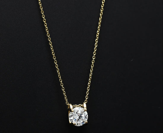 Load and play video in Gallery viewer, The 18k Gold Finish Solitaire Pendant with Chain
