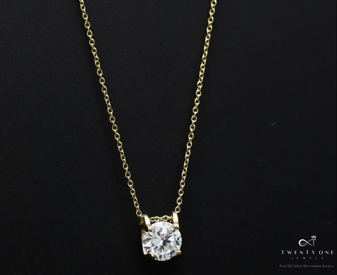 Load and play video in Gallery viewer, The 18k Gold Finish Solitaire Pendant with Chain
