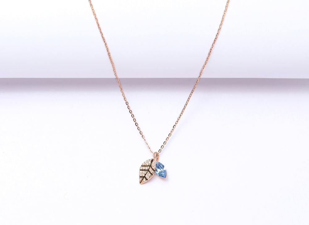 The Rose Gold Diamond Studded Samy Pendant with Blue Crystal