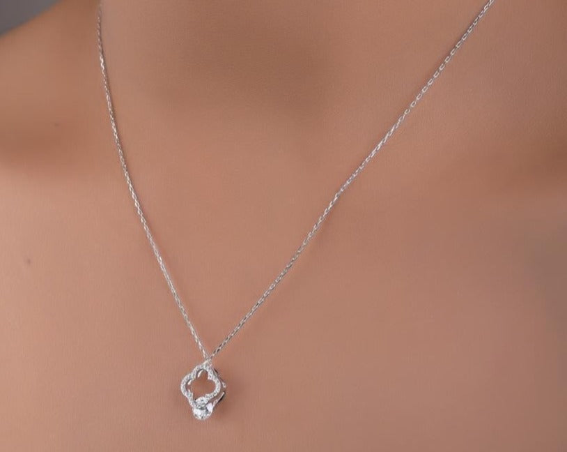 Milos Clover Leaf Pendant with Solitaire.